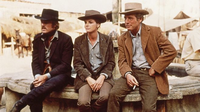 IMAGE: Robert Redford as the Sundance Kid, Katharine Ross as Etta Place, and Paul Newman as Butch Cassidy